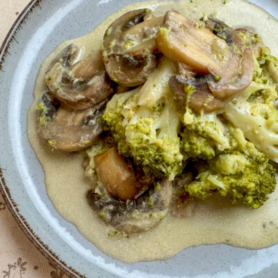 mushrooms and broccoli in a cream sauce